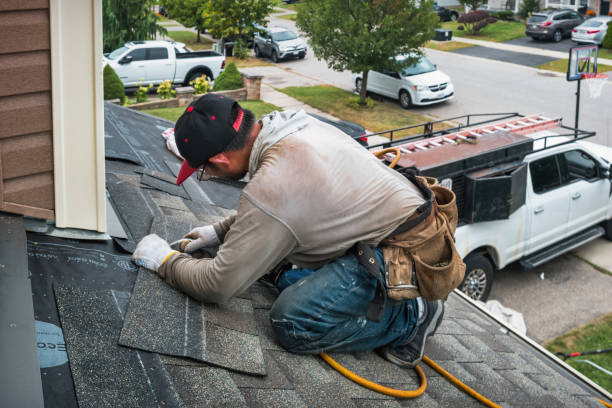 Professional Hail Damage Roof Repair technician working in Brownville, NJ